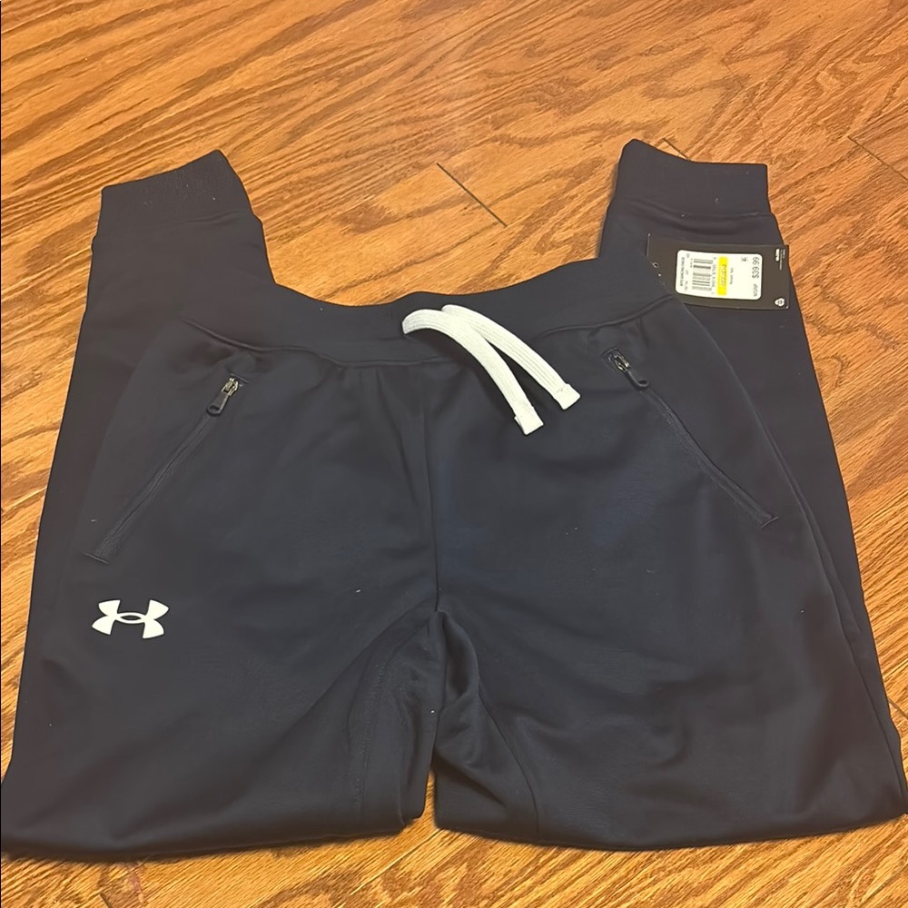Under Armour pennant pant/ joggers in navy blue, size M
